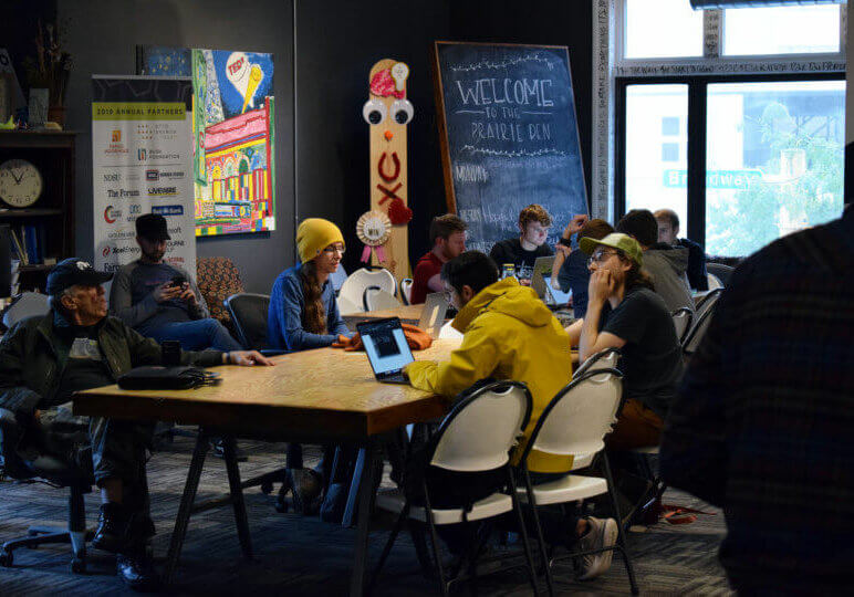 Participants of the 2019 Fargo Hackathon wait for kickoff. 